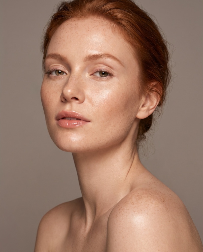 A skincare portrait in soft studio light